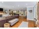 Open-concept living space with hardwood floors seamlessly flowing into the gourmet kitchen at 764 Stokeswood Se Ave, Atlanta, GA 30316