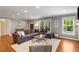 Spacious living room featuring hardwood floors, large windows, and ample natural light at 764 Stokeswood Se Ave, Atlanta, GA 30316