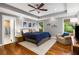 Spacious main bedroom with trey ceiling, hardwood floors, and stylish furnishings at 764 Stokeswood Se Ave, Atlanta, GA 30316