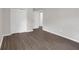 Bedroom featuring wood-look floors, closet, and a large window at 1641 Rockcliff Se Pl, Atlanta, GA 30316