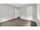 Bedroom featuring wood-look floors, and a large window at 1641 Rockcliff Se Pl, Atlanta, GA 30316