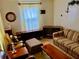 Living room with a vintage television, side tables, and comfortable furniture at 1968 Don Juan Ln, Decatur, GA 30032