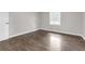 Light and airy bedroom with hardwood floors and a bright window at 2683 Rockcliff Se Rd, Atlanta, GA 30316