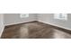 Bright bedroom with hardwood floors and natural light from two windows at 2683 Rockcliff Se Rd, Atlanta, GA 30316