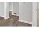 Hallway featuring neutral tones, wood paneling, hardwood floors and natural light at 2683 Rockcliff Se Rd, Atlanta, GA 30316