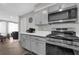 Modern kitchen featuring sleek cabinetry, stainless steel appliances, and a gas range at 2683 Rockcliff Se Rd, Atlanta, GA 30316