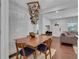 Dining room featuring hardwood floors and modern chandelier at 3093 Del Monico Dr, Decatur, GA 30032
