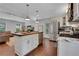 Bright kitchen with stainless steel appliances, wood island, and hardwood floors at 3093 Del Monico Dr, Decatur, GA 30032
