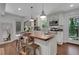 Well-appointed kitchen featuring modern appliances, a functional island, and access to outdoor spaces at 3093 Del Monico Dr, Decatur, GA 30032