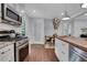 Kitchen with stainless appliances and hardwood floors at 3093 Del Monico Dr, Decatur, GA 30032