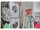Functional laundry area with stacked washer and dryer, plus storage at 3093 Del Monico Dr, Decatur, GA 30032