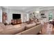 Inviting living room with a cozy sofa, TV, and an open floor plan, perfect for entertaining at 3093 Del Monico Dr, Decatur, GA 30032