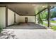 Large, covered patio perfect for entertaining, with views of the well-maintained front yard at 3093 Del Monico Dr, Decatur, GA 30032