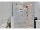 Modern shower features decorative tile and rainfall shower head at 3093 Del Monico Dr, Decatur, GA 30032