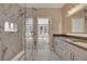 Elegant bathroom with marble shower, double vanity, and contemporary finishes at 454 Connally Se St, Atlanta, GA 30312