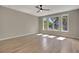 Bright and spacious bedroom featuring large windows and hardwood floors at 454 Connally Se St, Atlanta, GA 30312