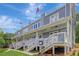 Charming townhouse row with inviting front porches and well-maintained landscaping at 454 Connally Se St, Atlanta, GA 30312