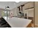 Open kitchen features a huge central island, stainless appliances, and chic design at 454 Connally Se St, Atlanta, GA 30312