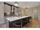 Contemporary kitchen with stainless steel appliances, a large island, and modern lighting at 454 Connally Se St, Atlanta, GA 30312