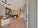 Inviting open-concept living space with hardwood floors, a staircase, and stylish decor at 454 Connally Se St, Atlanta, GA 30312