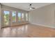Sun-filled living room featuring hardwood floors and ample natural light at 454 Connally Se St, Atlanta, GA 30312