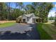 Beautiful single-story home featuring dark trim windows and a covered carport at Lot 2 Harmony Rd, Temple, GA 30179