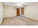 Simple bedroom featuring carpeted flooring, natural lighting, and a window view at 137 Trickum Hills Dr, Woodstock, GA 30188