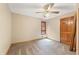 Bedroom features carpeted flooring, natural lighting, and a ceiling fan at 137 Trickum Hills Dr, Woodstock, GA 30188