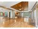 Open concept living room with hardwood floors, wood ceiling, recessed lights, and lots of windows at 137 Trickum Hills Dr, Woodstock, GA 30188