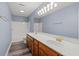 Bathroom featuring double sinks, updated fixtures, and a shower at 2333 Old Newnan Rd, Carrollton, GA 30116