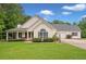 Charming single-Gathering home with inviting front porch and lush green lawn in a quiet neighborhood at 2333 Old Newnan Rd, Carrollton, GA 30116