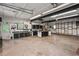 Well-lit garage featuring an island, sink, storage cabinets, and ample workspace at 2333 Old Newnan Rd, Carrollton, GA 30116