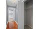 Hallway featuring hardwood floors, a closet, and access to other rooms at 2333 Old Newnan Rd, Carrollton, GA 30116
