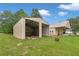 Property featuring two sheds offering ample storage and workshop space in a grassy backyard at 2333 Old Newnan Rd, Carrollton, GA 30116