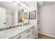 Bright bathroom features a double sink vanity with marble countertop and modern fixtures at 3063 Broadleaf Trl, Fairburn, GA 30213