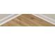 Close-up of luxury vinyl plank flooring with a wood-like texture and natural color variations at 3063 Broadleaf Trl, Fairburn, GA 30213