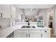 Modern kitchen with quartz countertops and stainless steel sink at 3063 Broadleaf Trl, Fairburn, GA 30213
