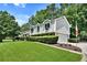 Well-maintained home featuring vinyl siding, an attached garage, and a manicured front lawn at 3107 Bunker Hill Cir, Marietta, GA 30062