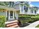 Welcoming front entrance with decorative wreath, elegant sidelights, and inviting brick steps at 3107 Bunker Hill Cir, Marietta, GA 30062