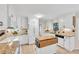 Well-lit kitchen with white cabinets, granite countertops, tile backsplash, and stainless steel appliances at 3107 Bunker Hill Cir, Marietta, GA 30062
