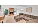 Inviting living room featuring a brick fireplace, plush seating, and natural light at 3107 Bunker Hill Cir, Marietta, GA 30062