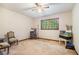 Bedroom with a window and carpeted floor at 5317 Highway 81, Loganville, GA 30052