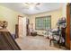 Bedroom with a window, carpeted floor at 5317 Highway 81, Loganville, GA 30052