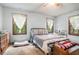 Bedroom with natural light, ceiling fan and carpeted floor at 5317 Highway 81, Loganville, GA 30052