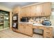 Kitchen featuring stainless steel appliances, tile backsplash, and a breakfast nook at 5317 Highway 81, Loganville, GA 30052