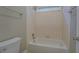 Simple bathroom with tiled shower/tub combo and updated fixtures at 1065 Chippewa Oak Dr, Dacula, GA 30019