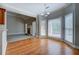 Dining area features hardwood flooring, chandelier lighting, and large windows at 1065 Chippewa Oak Dr, Dacula, GA 30019