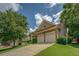 Charming single-Gathering home featuring a well-manicured lawn, mature trees, and a convenient two-car garage at 1065 Chippewa Oak Dr, Dacula, GA 30019