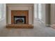 Stylish living room fireplace with white pillars, enhancing the room's appeal and creating a cozy, focal point at 1065 Chippewa Oak Dr, Dacula, GA 30019