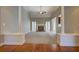Expansive living room with a vaulted ceiling, fireplace, and open flow to adjacent rooms, ideal for gatherings at 1065 Chippewa Oak Dr, Dacula, GA 30019
